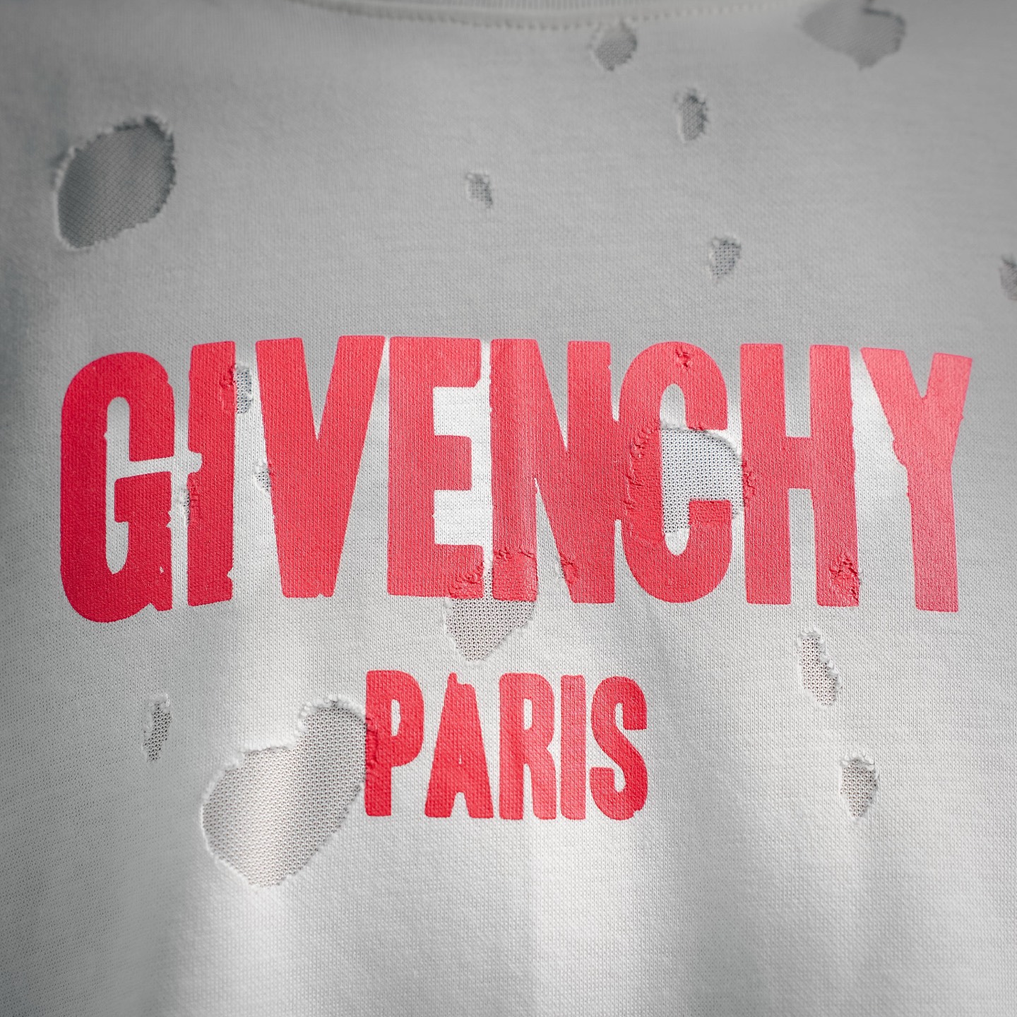 Given ripped t-shirt