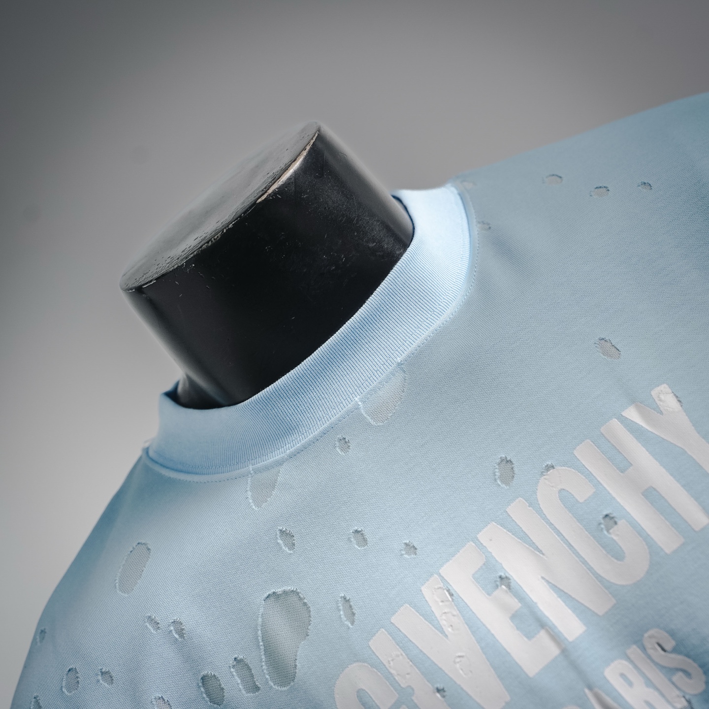 Given ripped t-shirt
