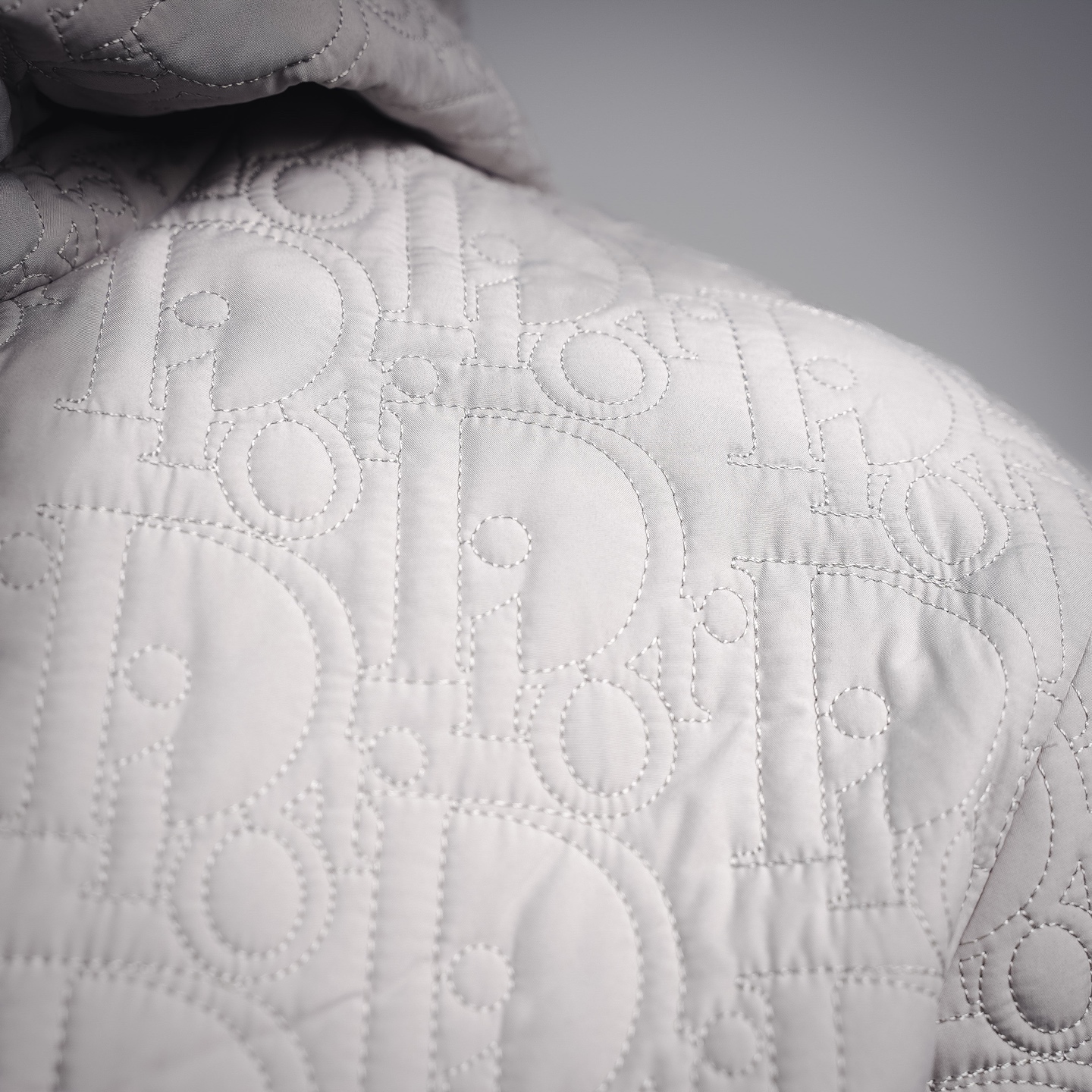 CD quilted embossed jacket