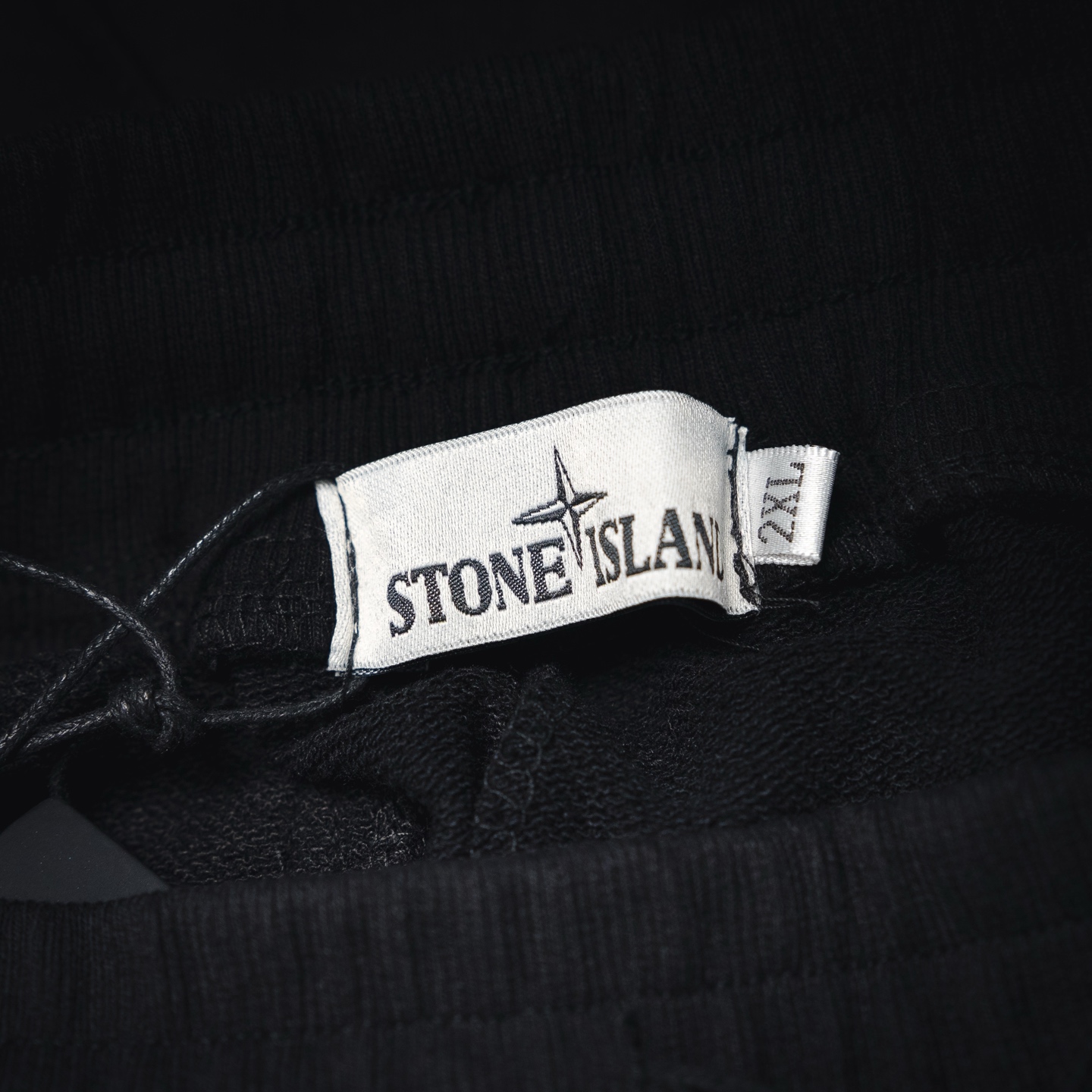 Stone logo badge pants