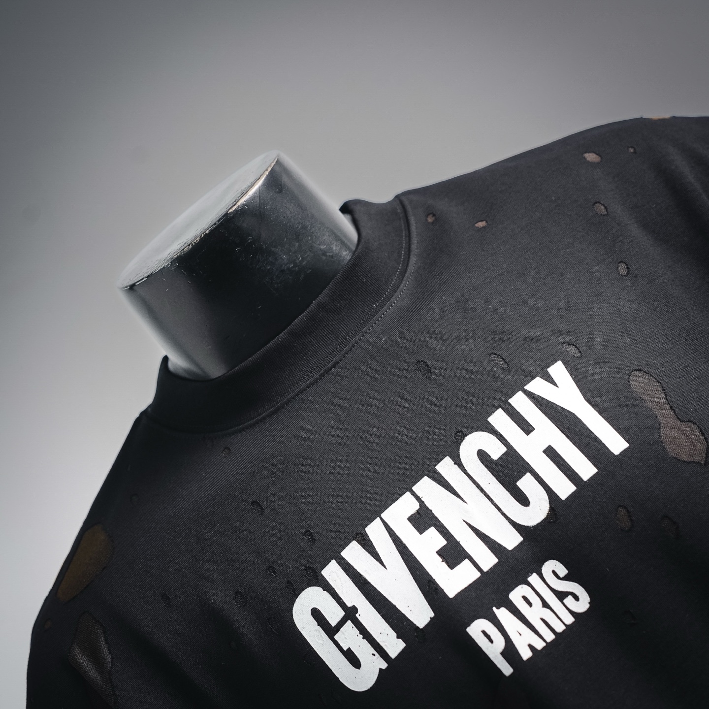 Given ripped t-shirt