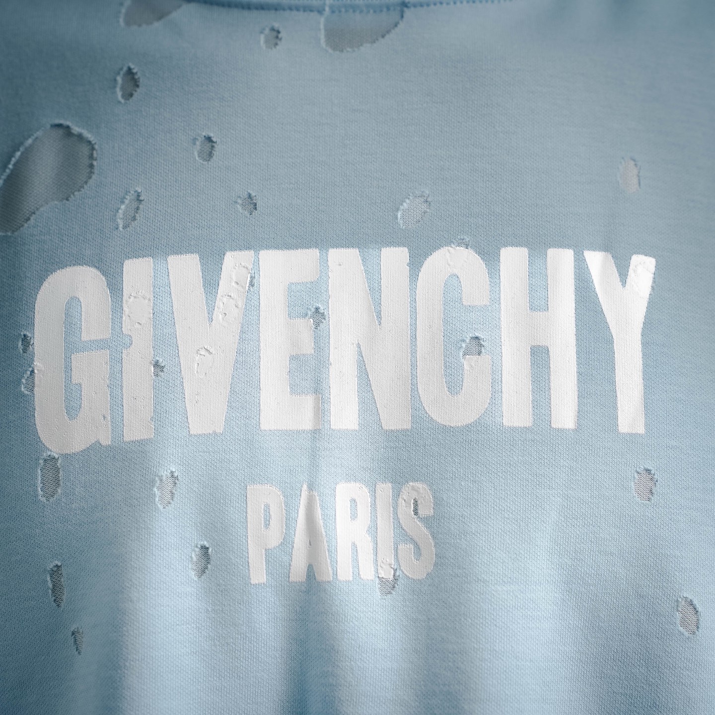 Given ripped t-shirt