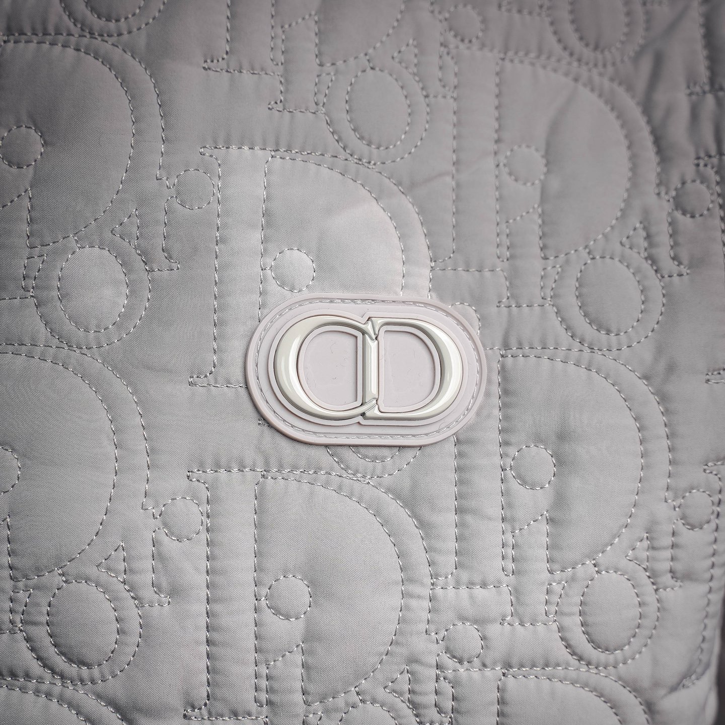 CD quilted embossed jacket