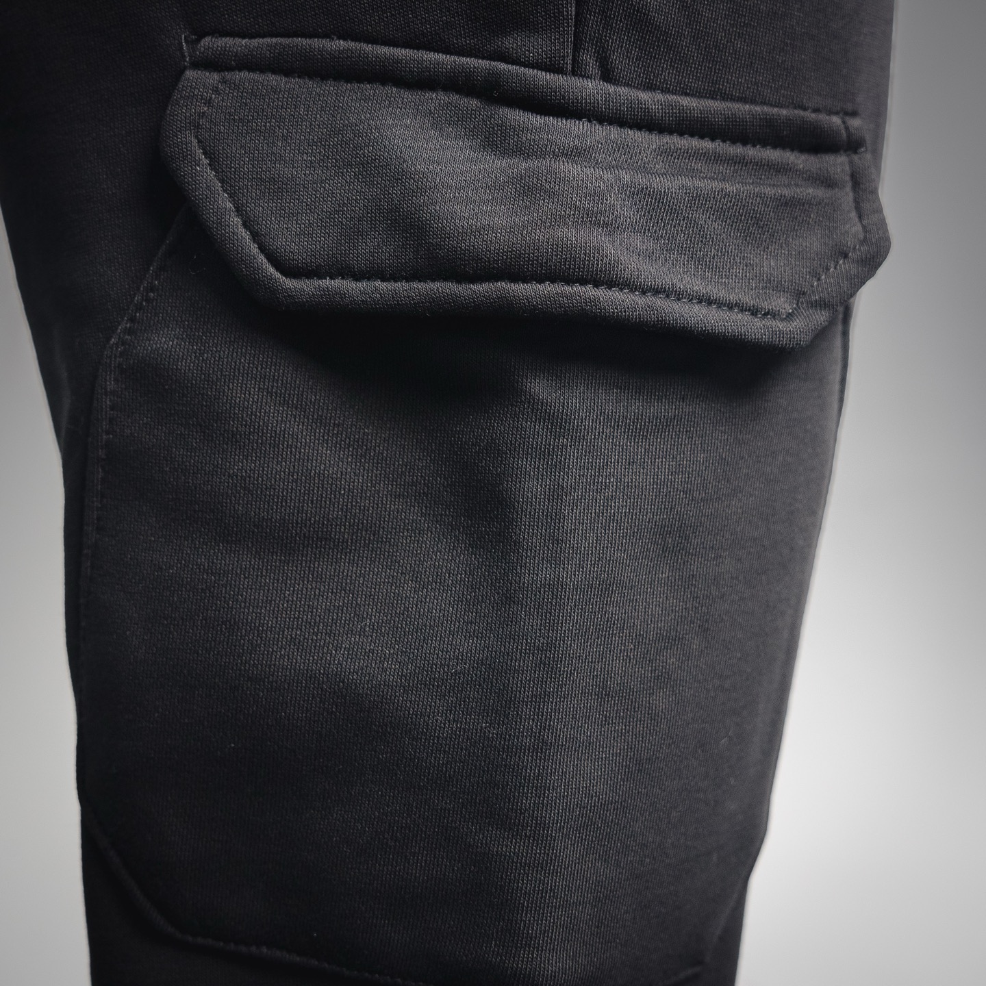Stone logo badge pants
