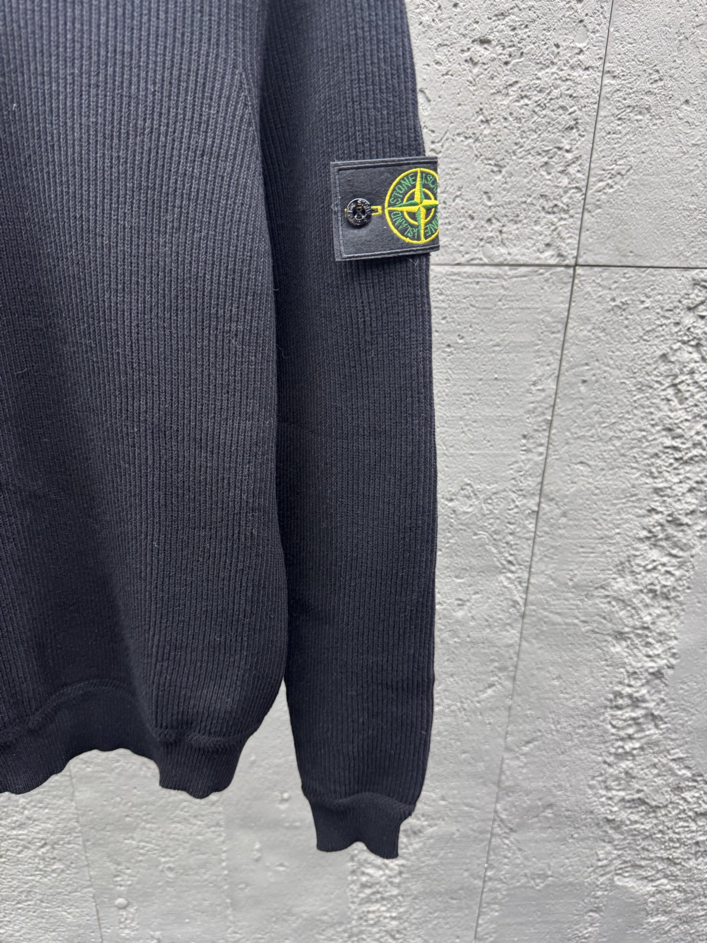 Stone logo badge sweater