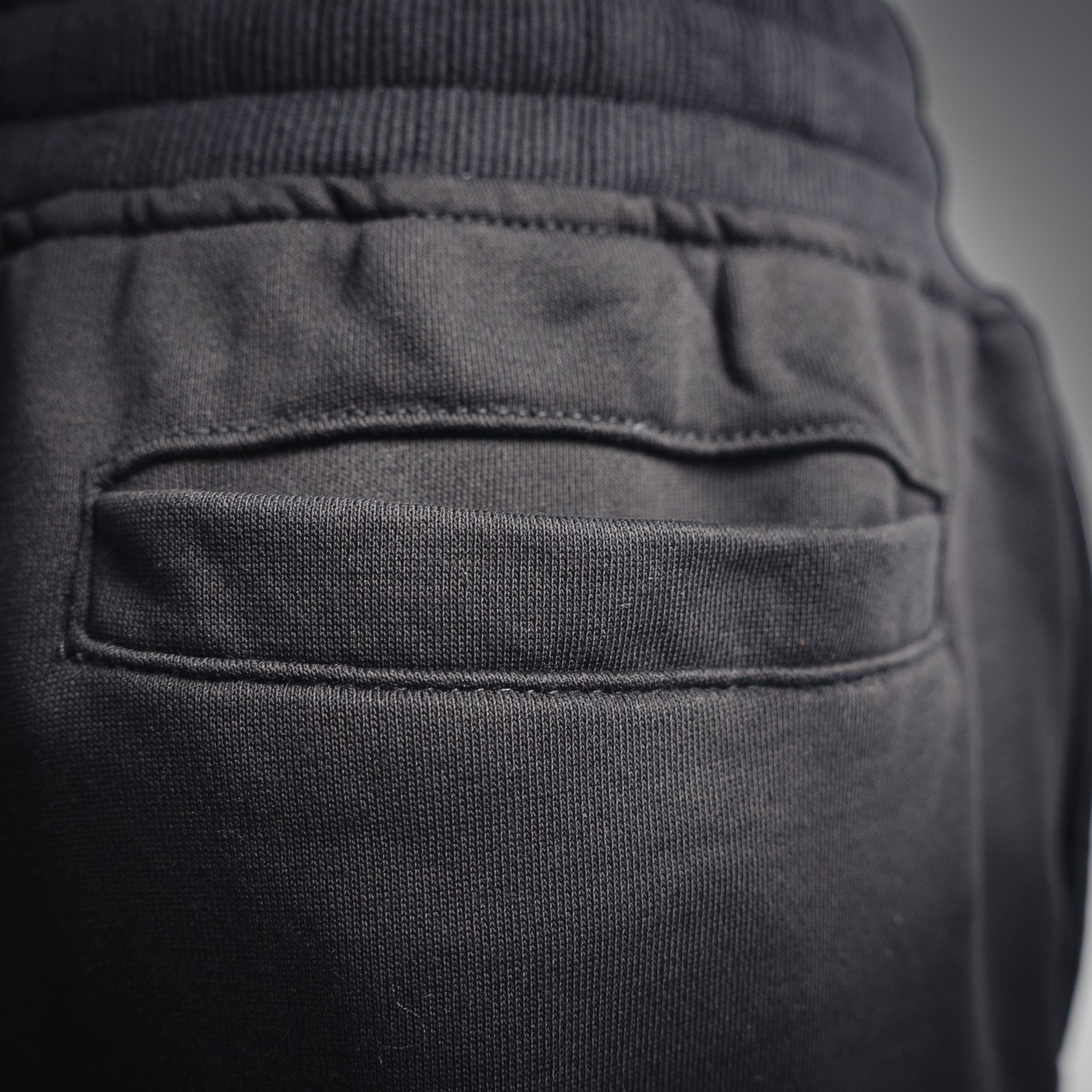 Stone logo badge pants