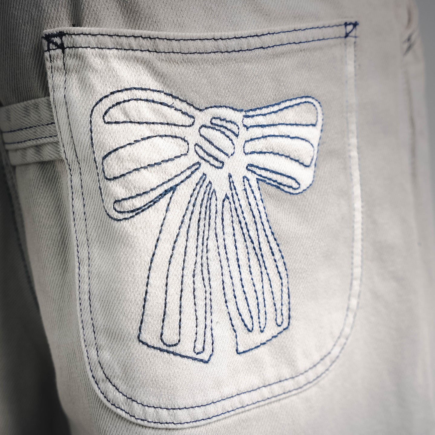 Acen butterfly embroidered jeans
