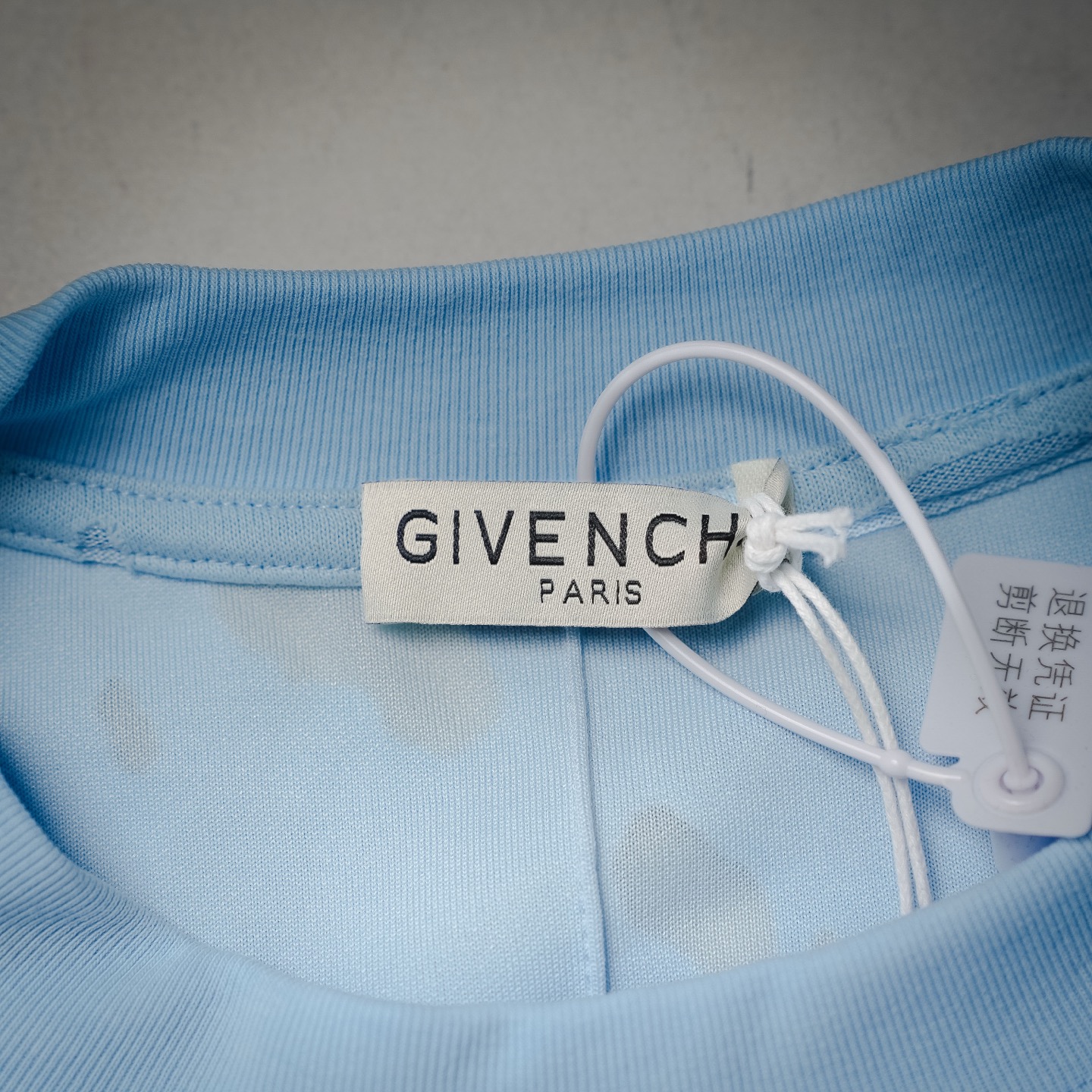 Given ripped t-shirt