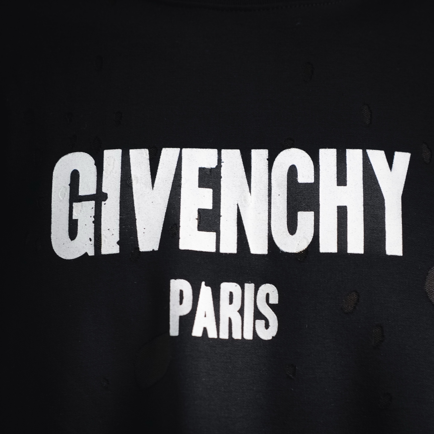 Given ripped t-shirt