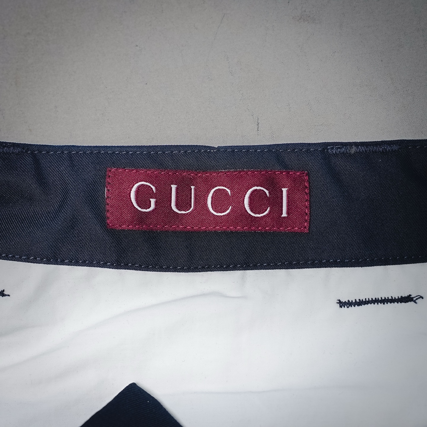 Guc letter printed pants