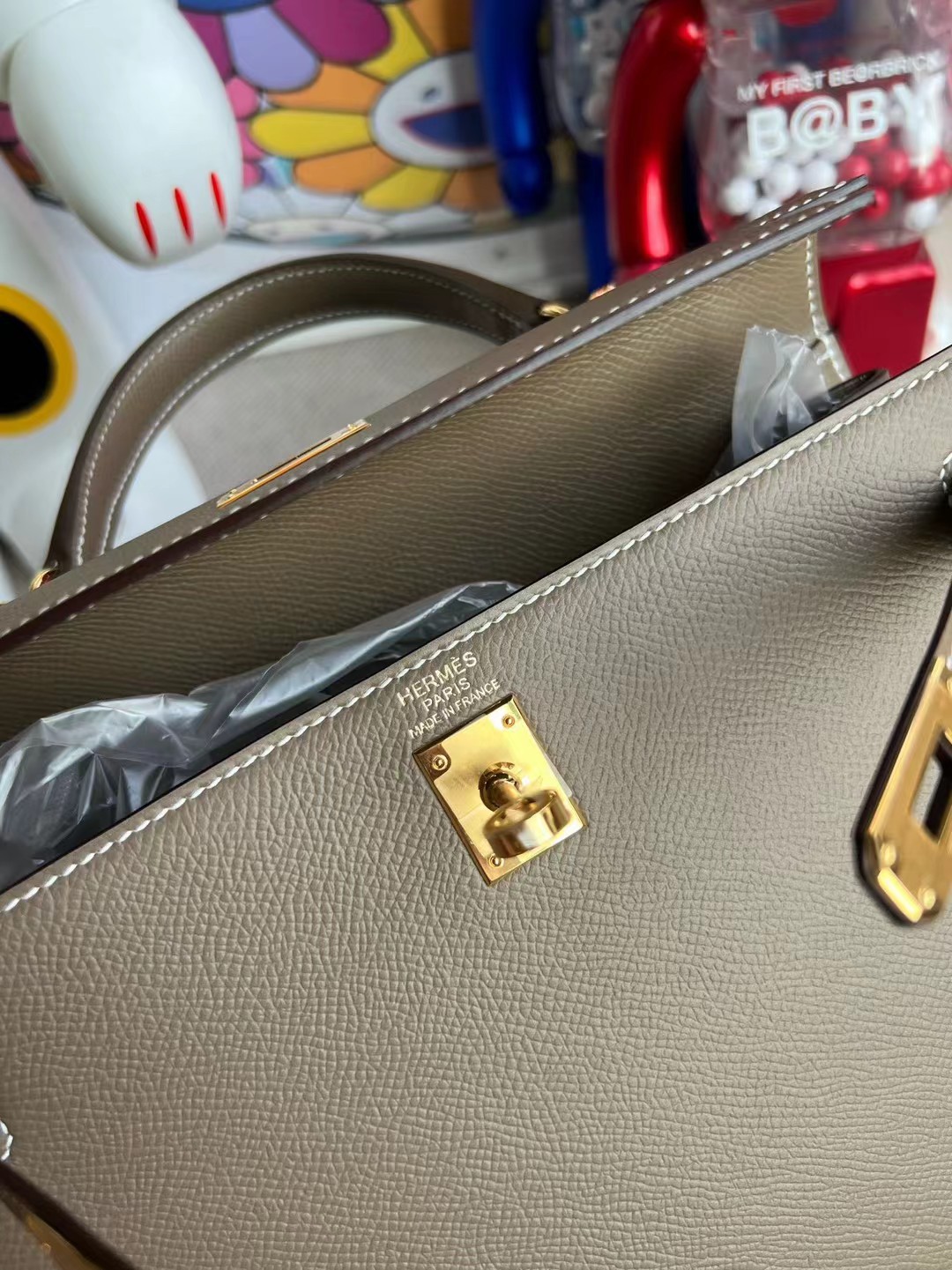 Herm kelly 25cm epsom gold