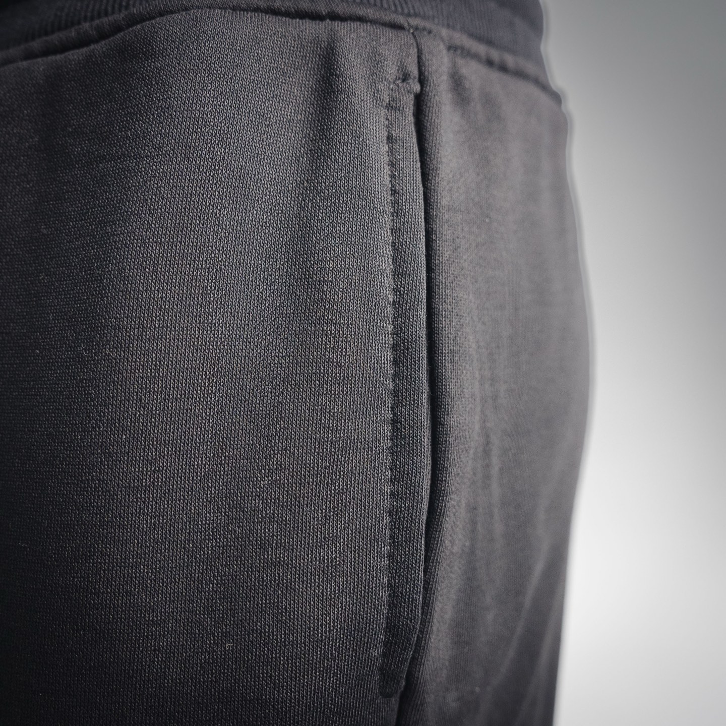 Stone logo badge pants
