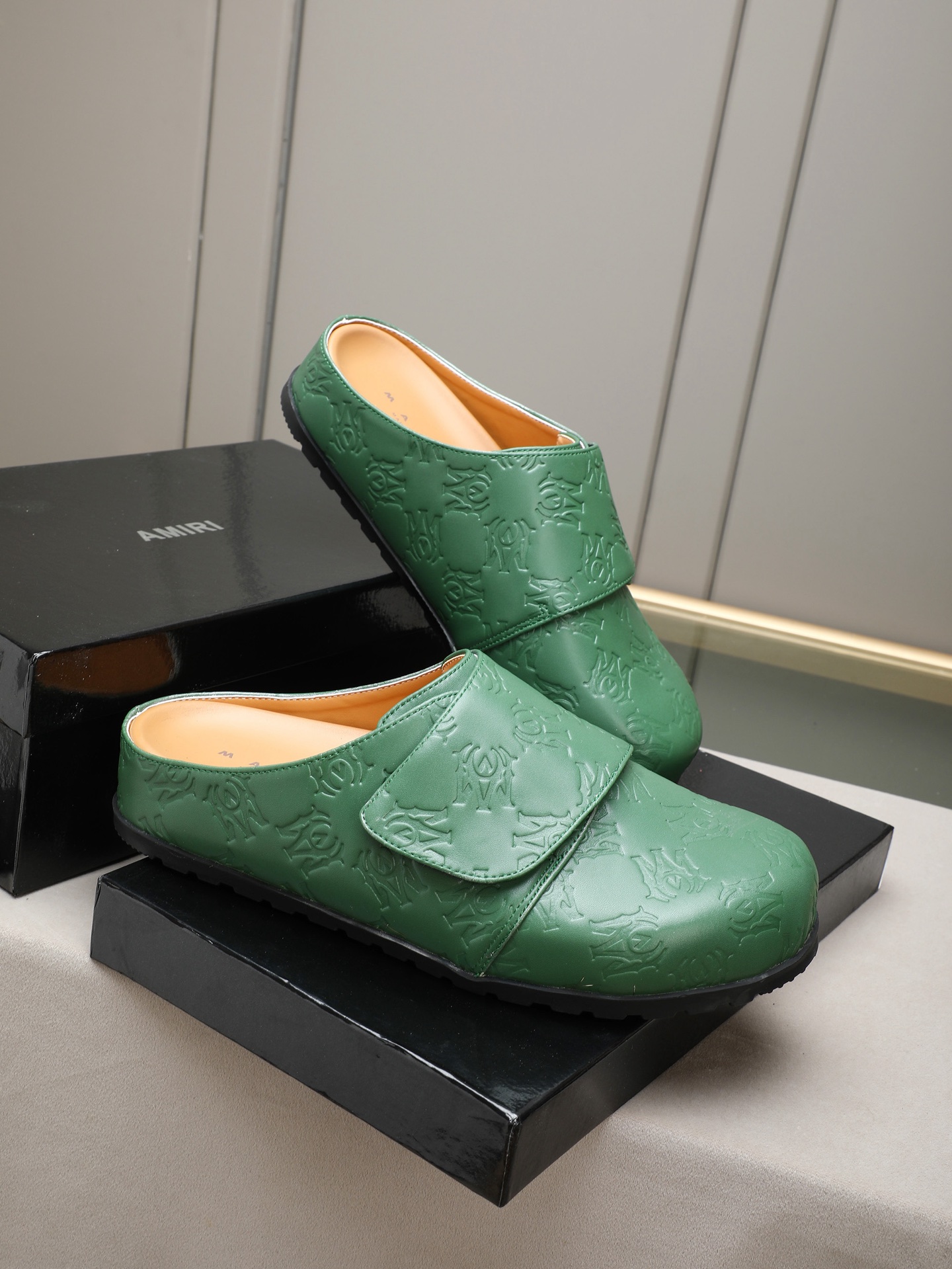 Ami embossed mules
