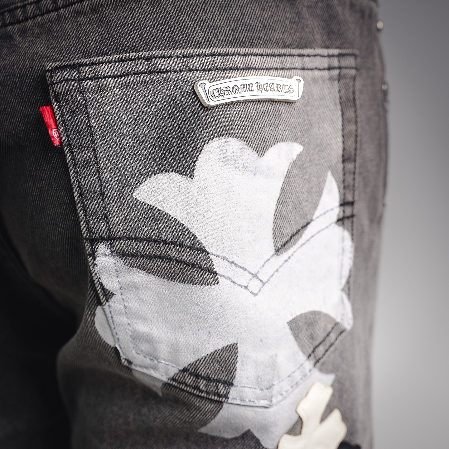 Chrome washed applique jeans