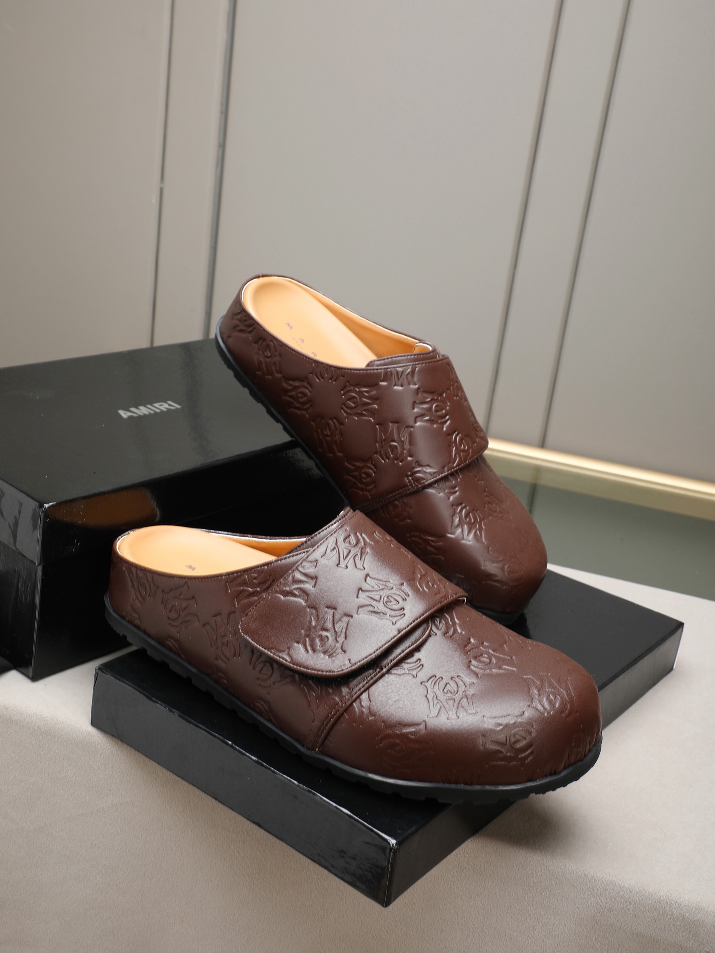Ami embossed mules