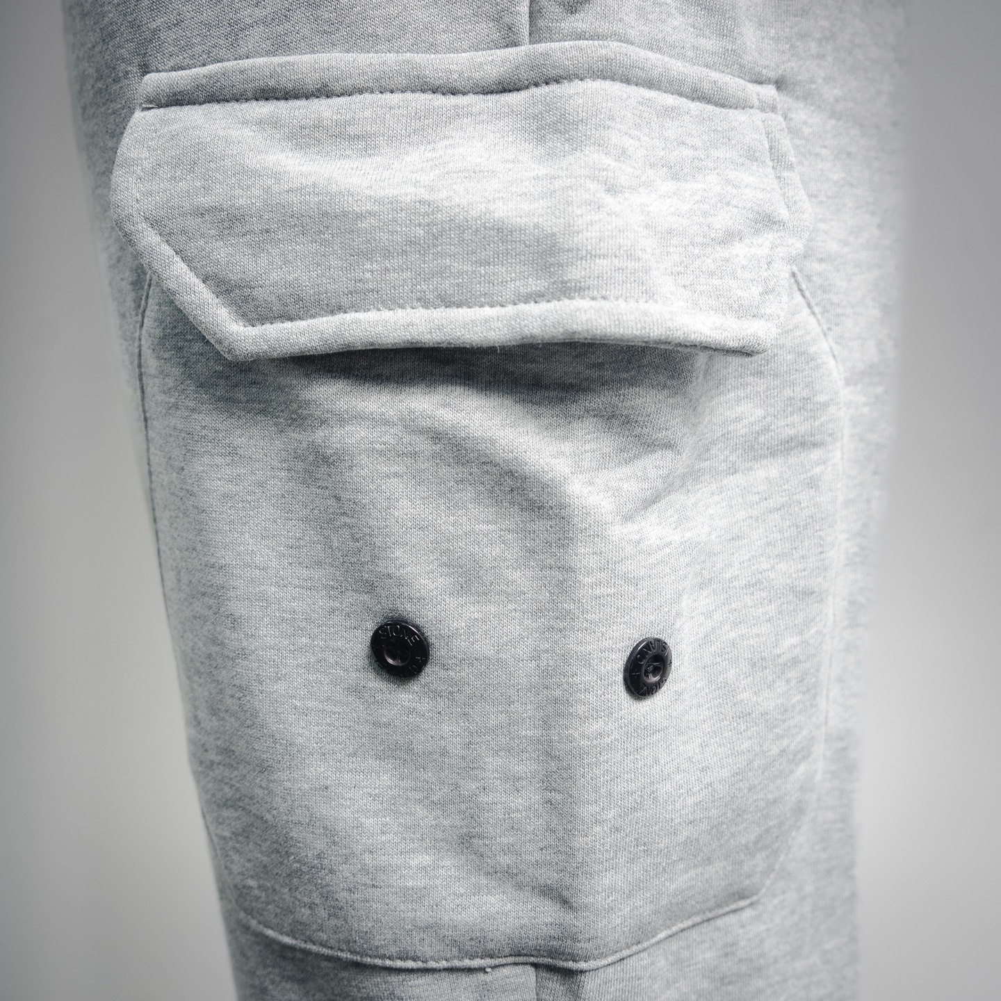 Stone logo badge pants
