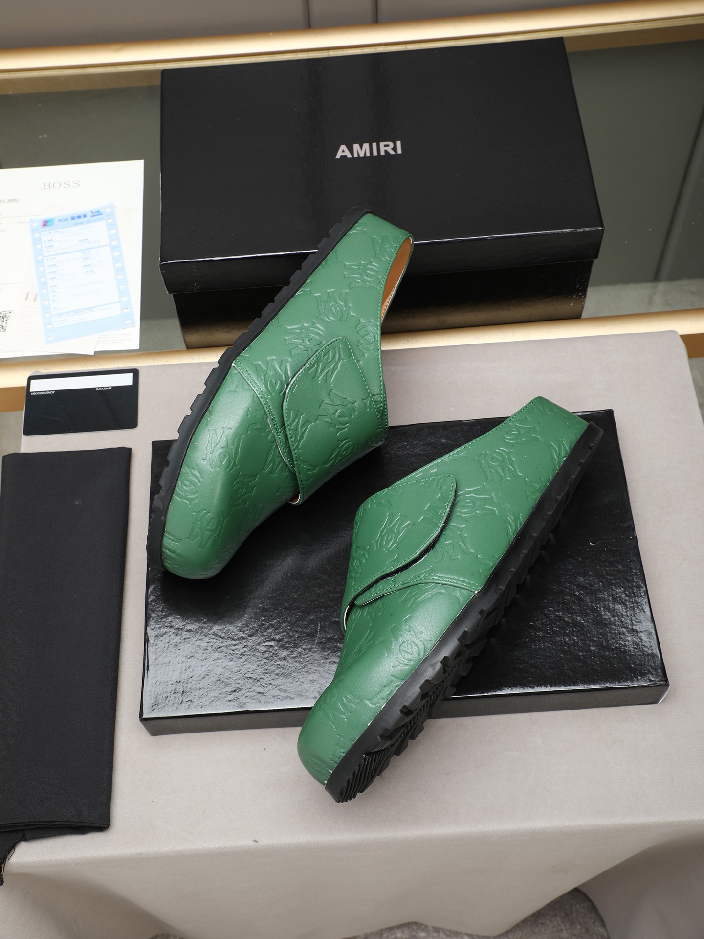 Ami embossed mules