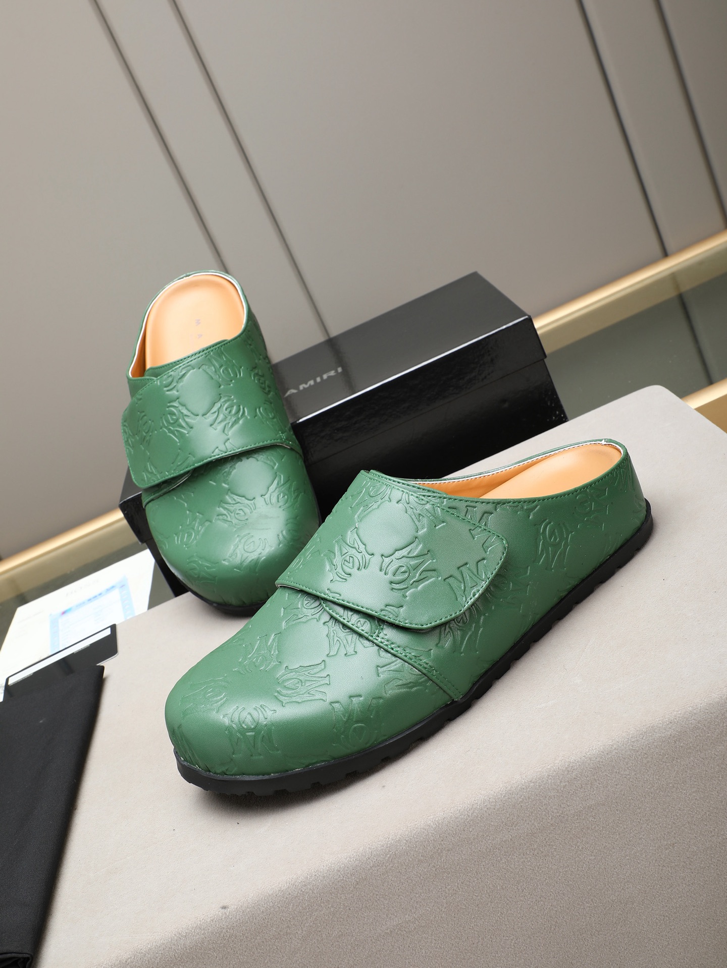 Ami embossed mules