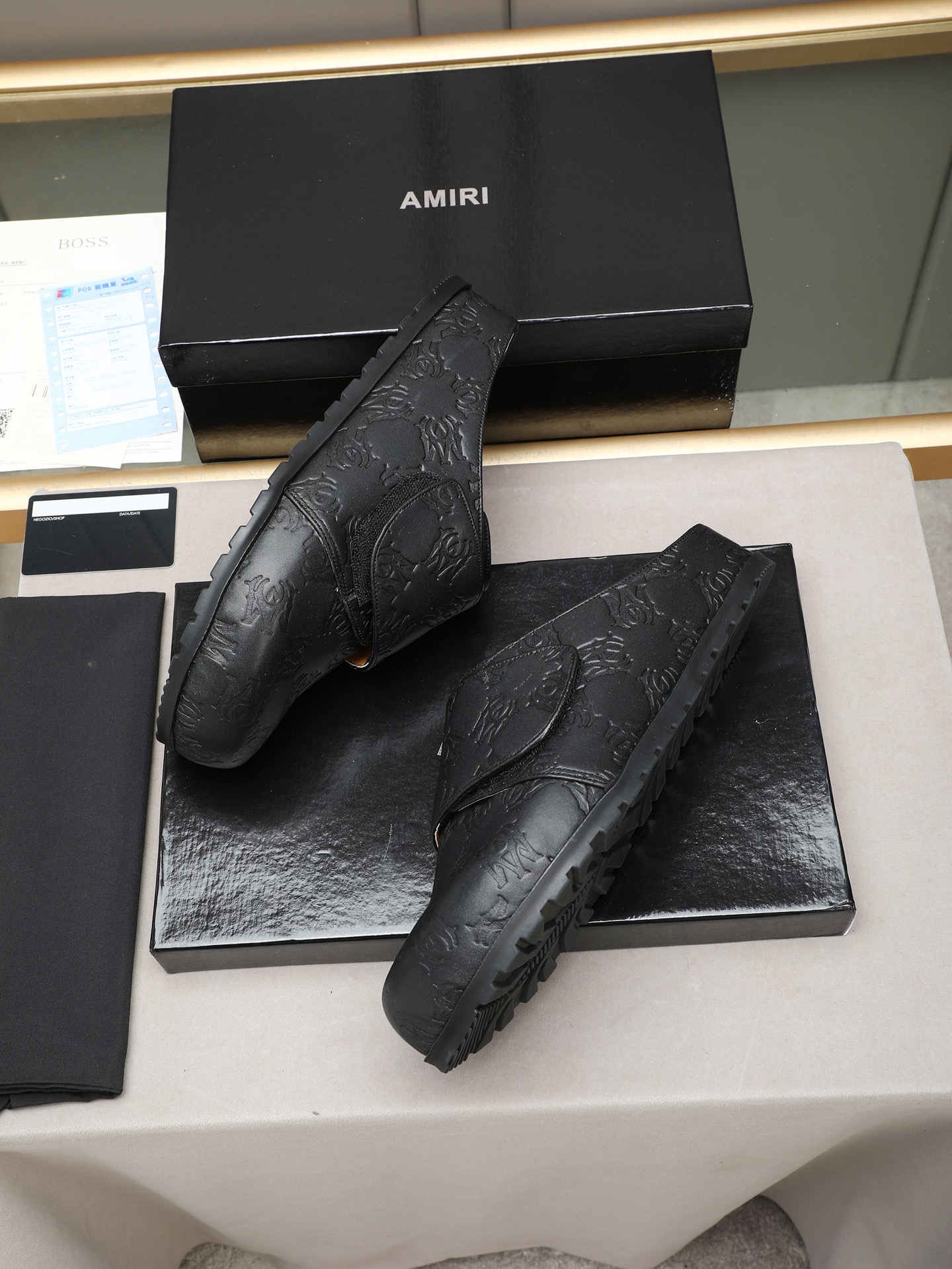 Ami embossed mules