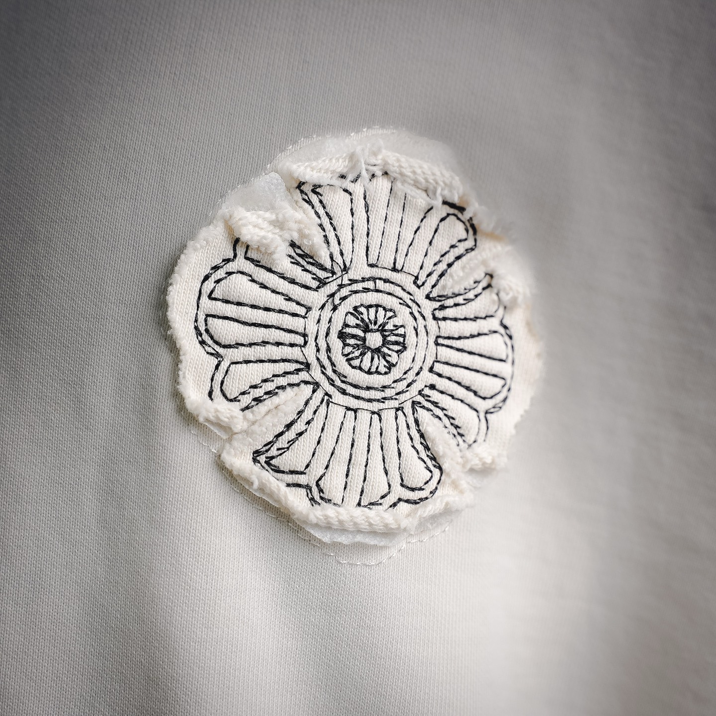 Chrome washed applique hoodie