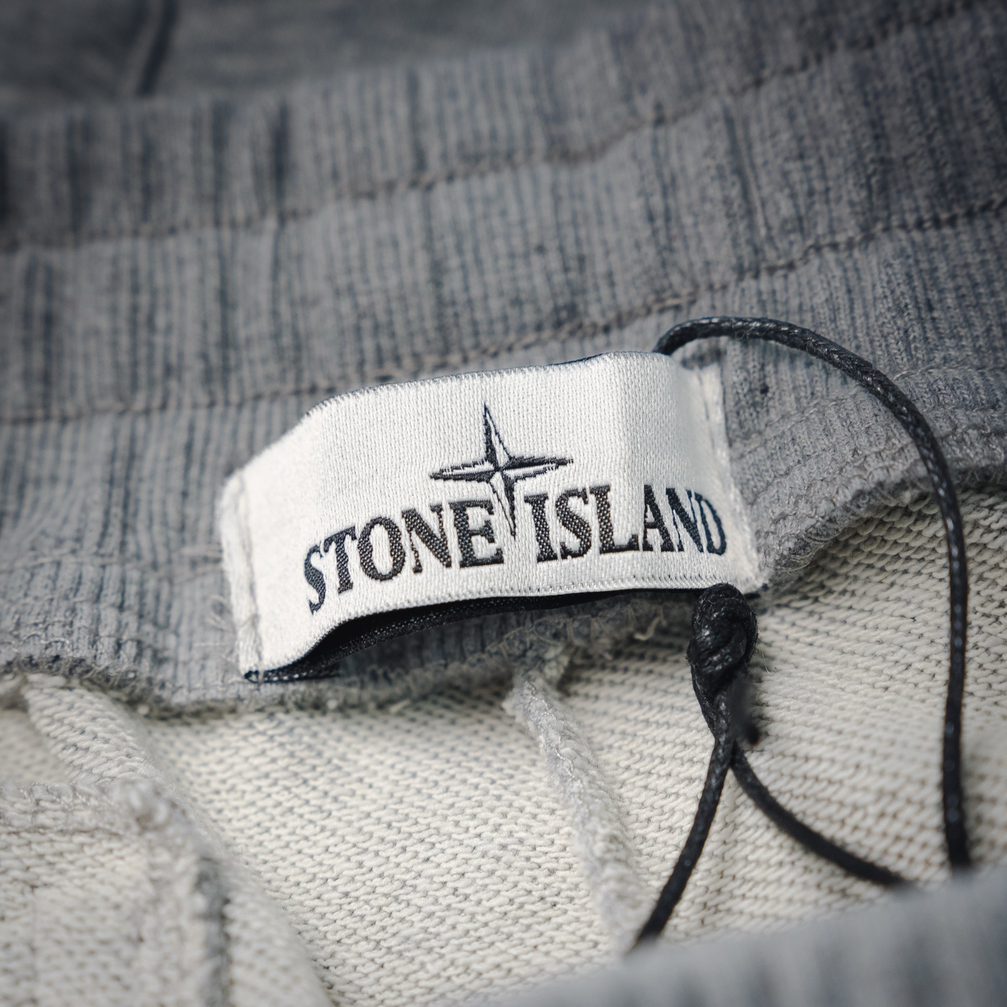 Stone logo badge pants