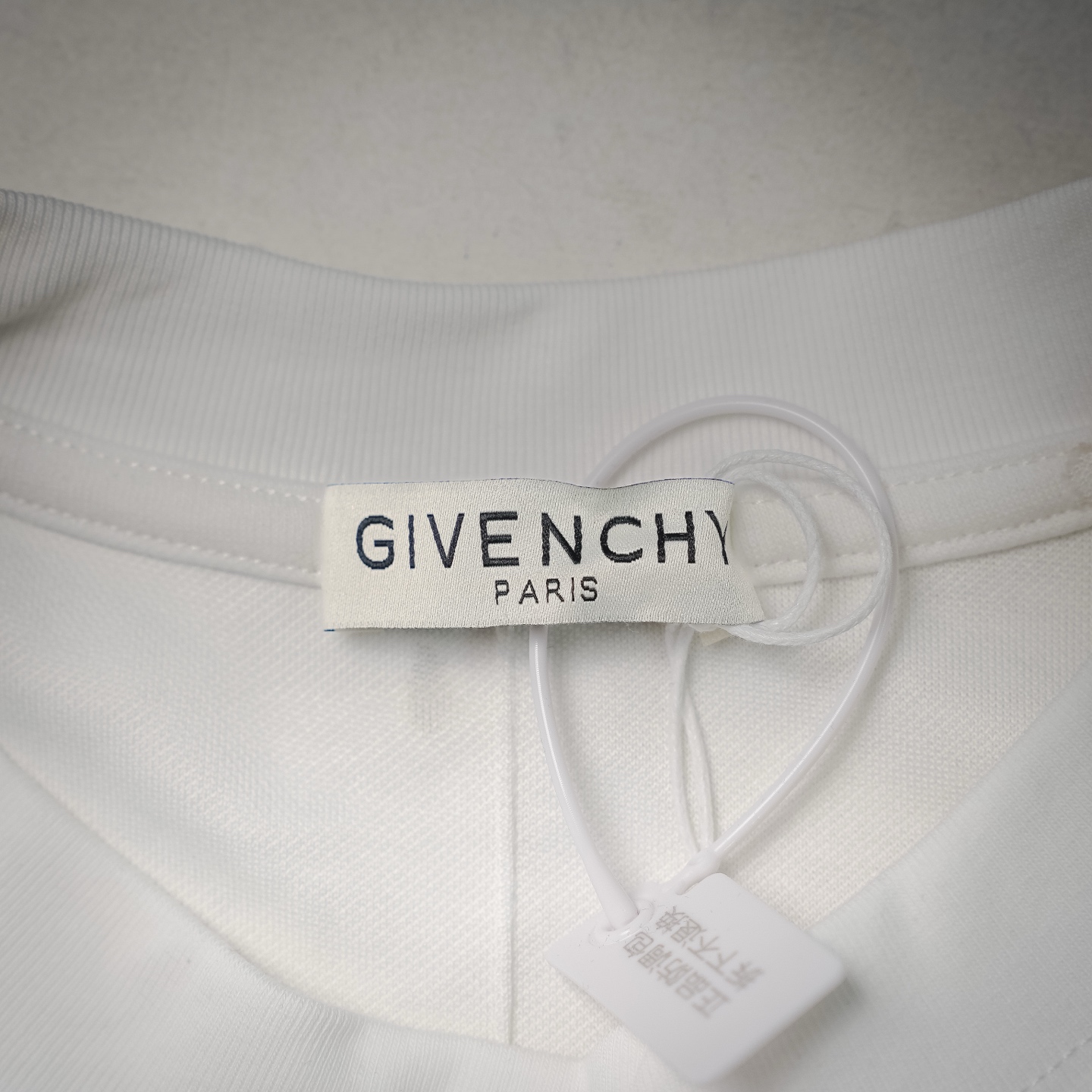 Given ripped t-shirt