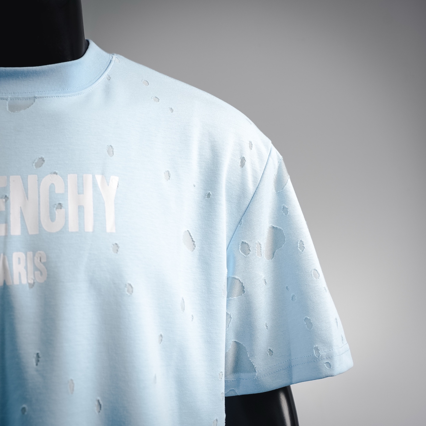 Given ripped t-shirt