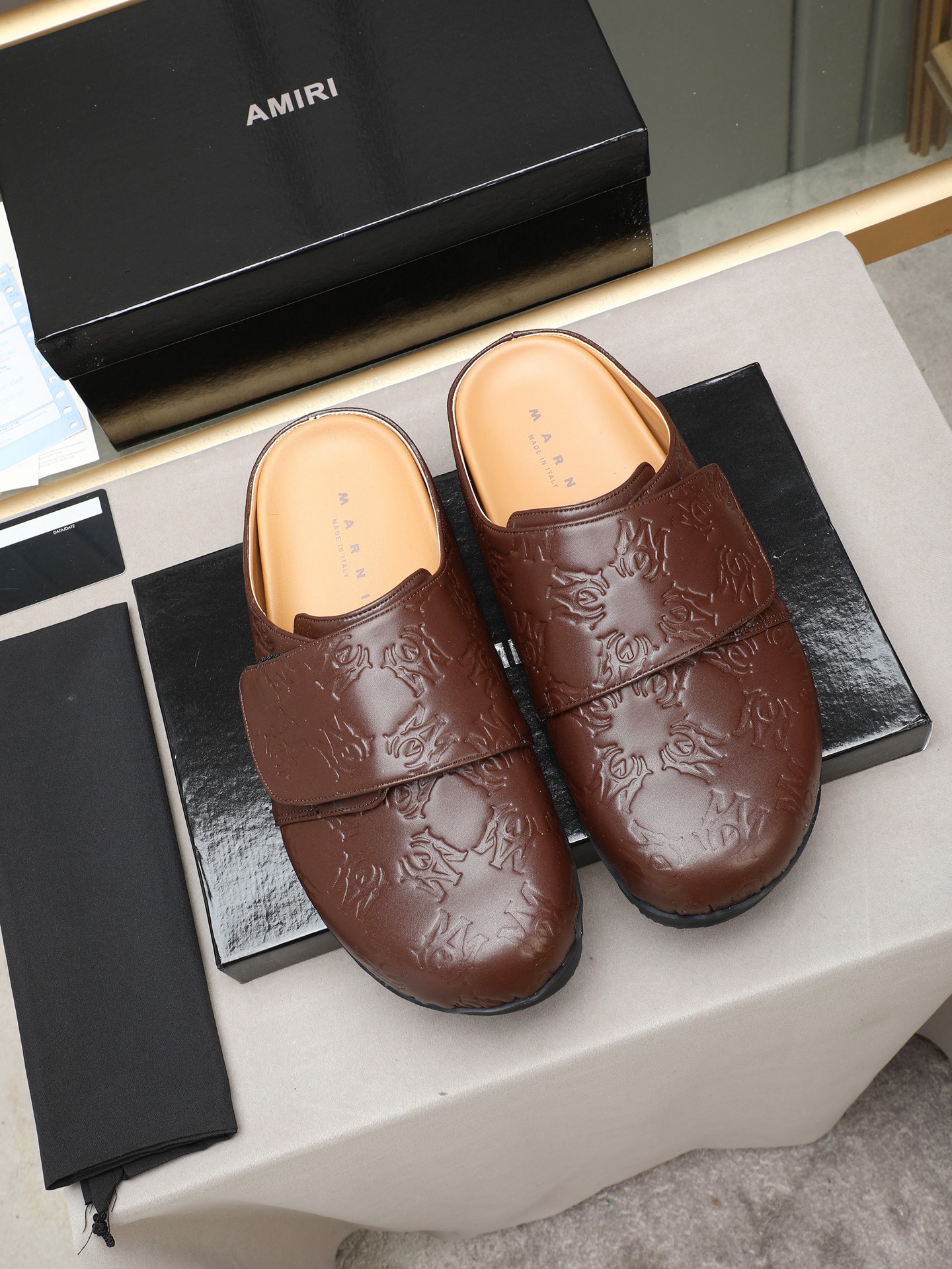 Ami embossed mules